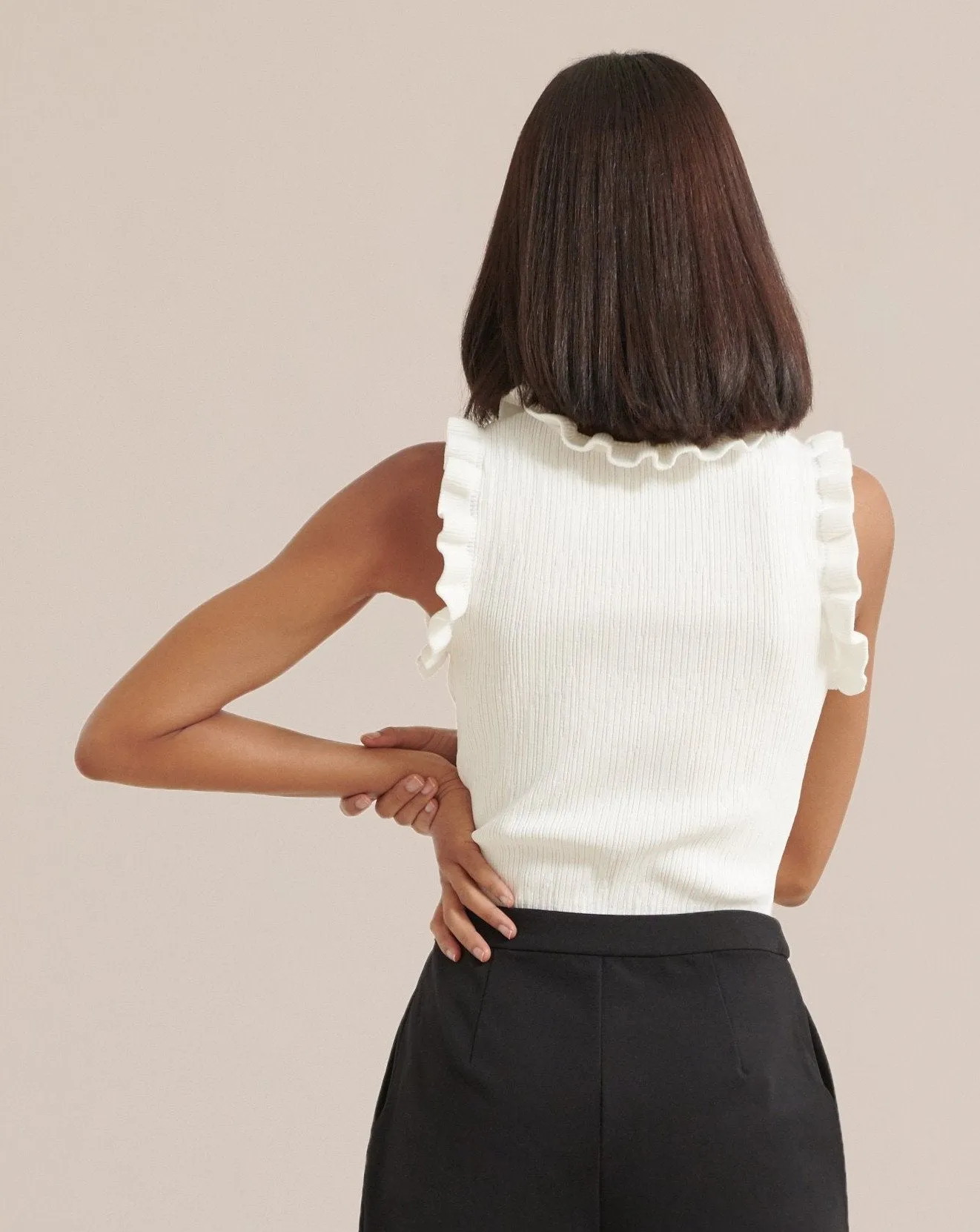 Azza Sleeveless Ruffle Trim Blouse